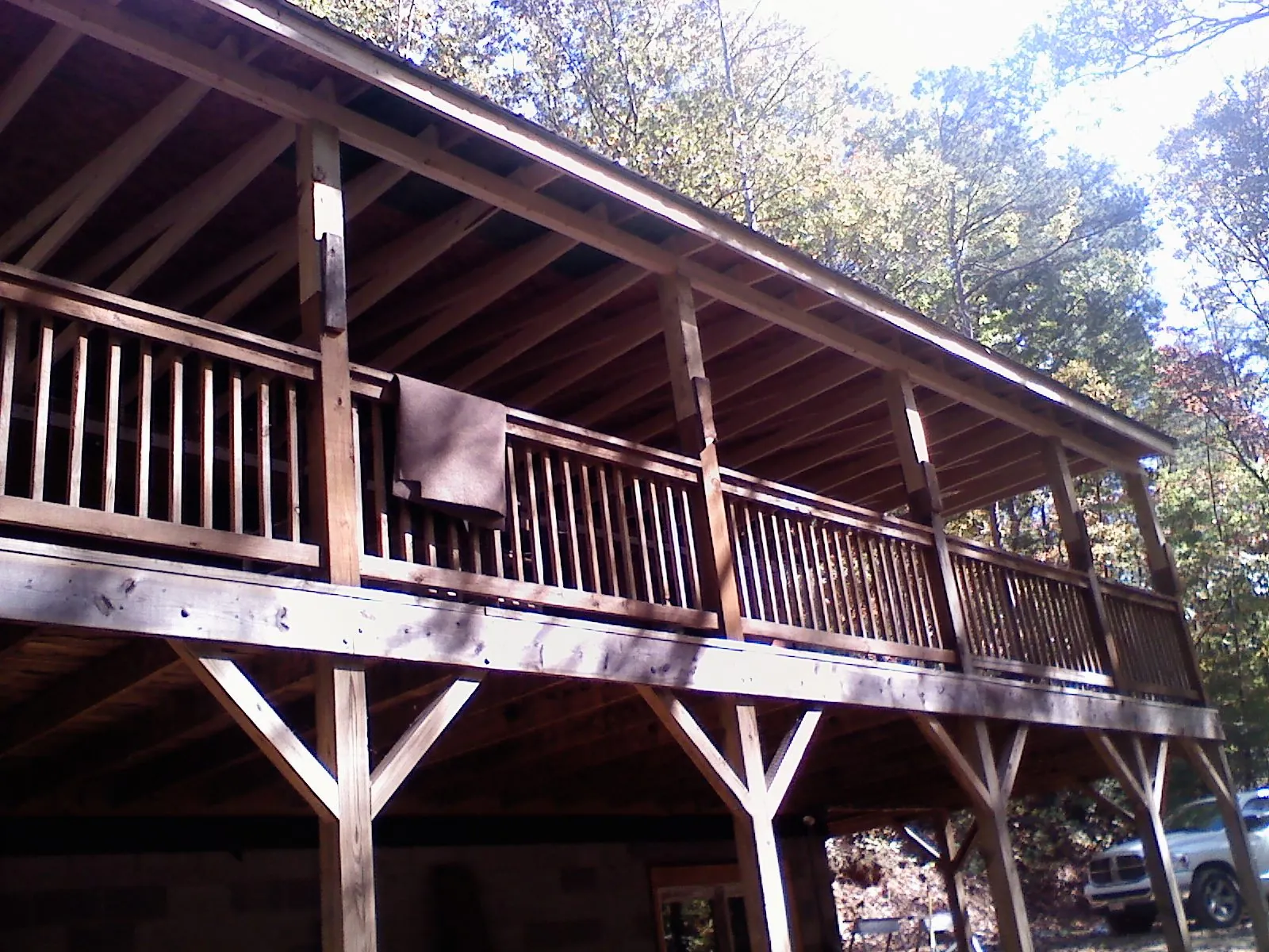 Timber framing under a new elevated porch and deck — Roof Leak Repair in West Bloomfield by Roofing Brothers